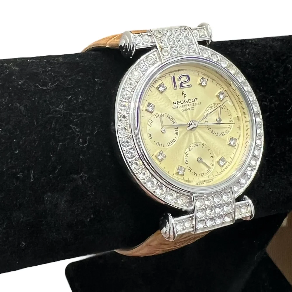 P. PEUGEOT YELLOW FACE & CROCODILE STAMPED BAND WITH CRYSTAL BEZEL WATCH